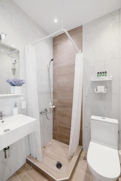 Vannituba majutusasutuses Athos Guest House Pansion