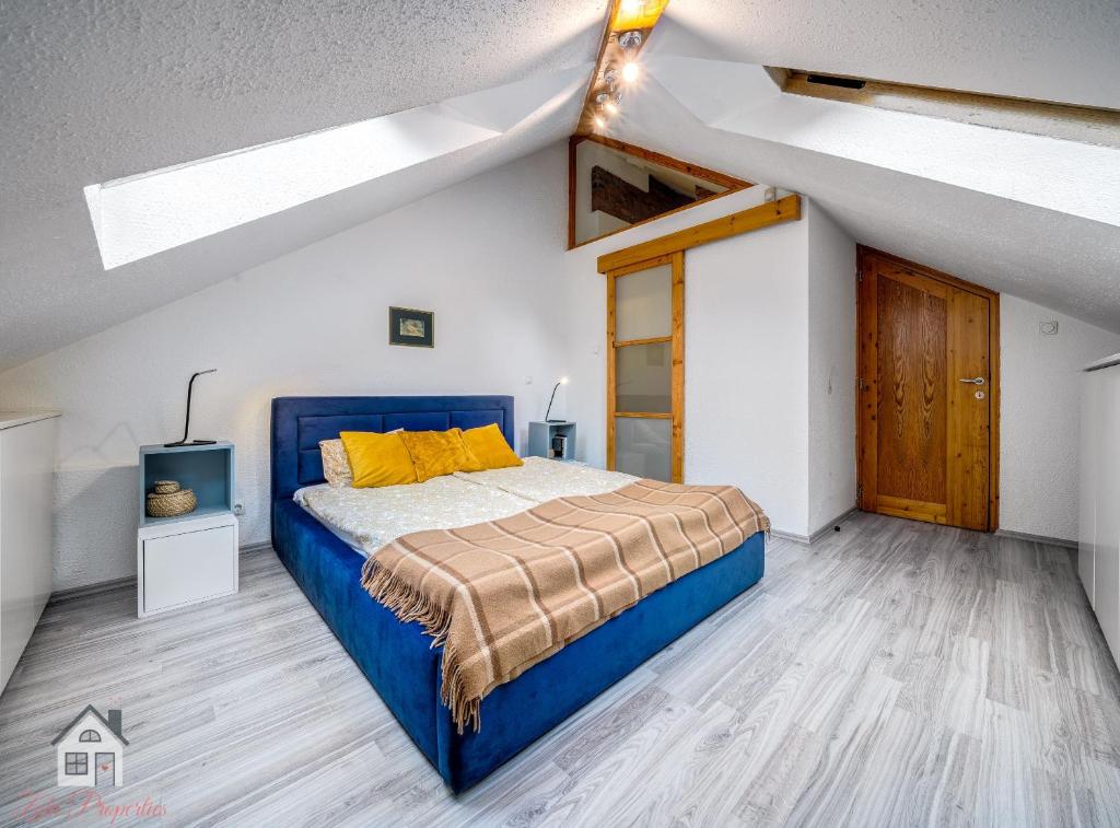 Postel nebo postele na pokoji v ubytování ACME Apartments