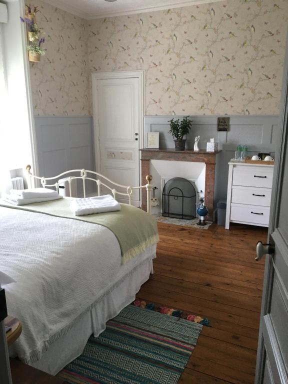 Postel nebo postele na pokoji v ubytování Le Presbytère Chambre D'Hôtes