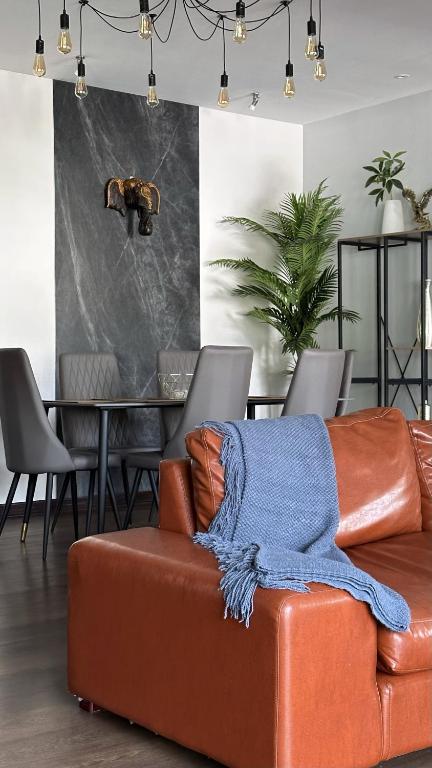 Posezení v ubytování Grand Orlov Apart Hotel