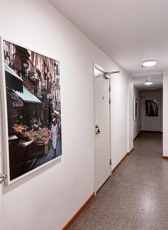 TV a/nebo společenská místnost v ubytování Gårdens & Apotekarns B&B