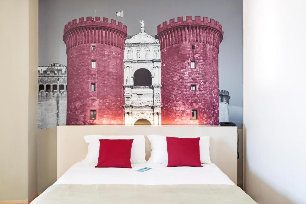 Postel nebo postele na pokoji v ubytování B&B Hotel Napoli