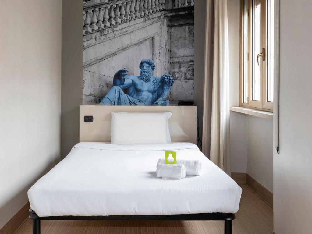 Postel nebo postele na pokoji v ubytování B&B Hotel Roma Trastevere