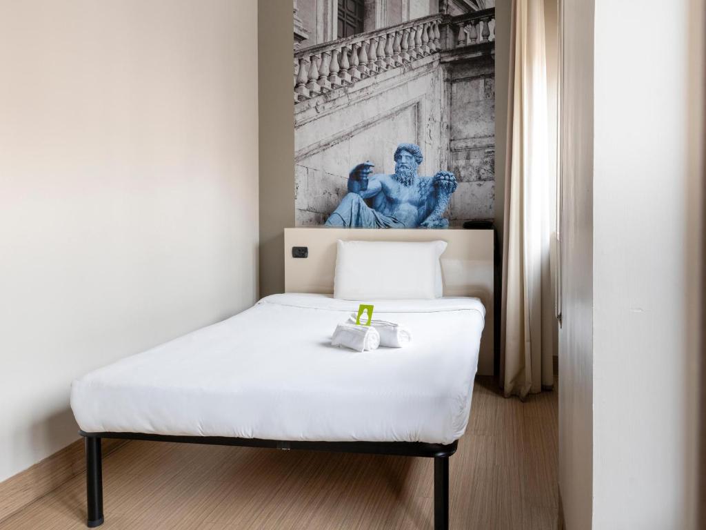 Postel nebo postele na pokoji v ubytování B&B Hotel Roma Trastevere