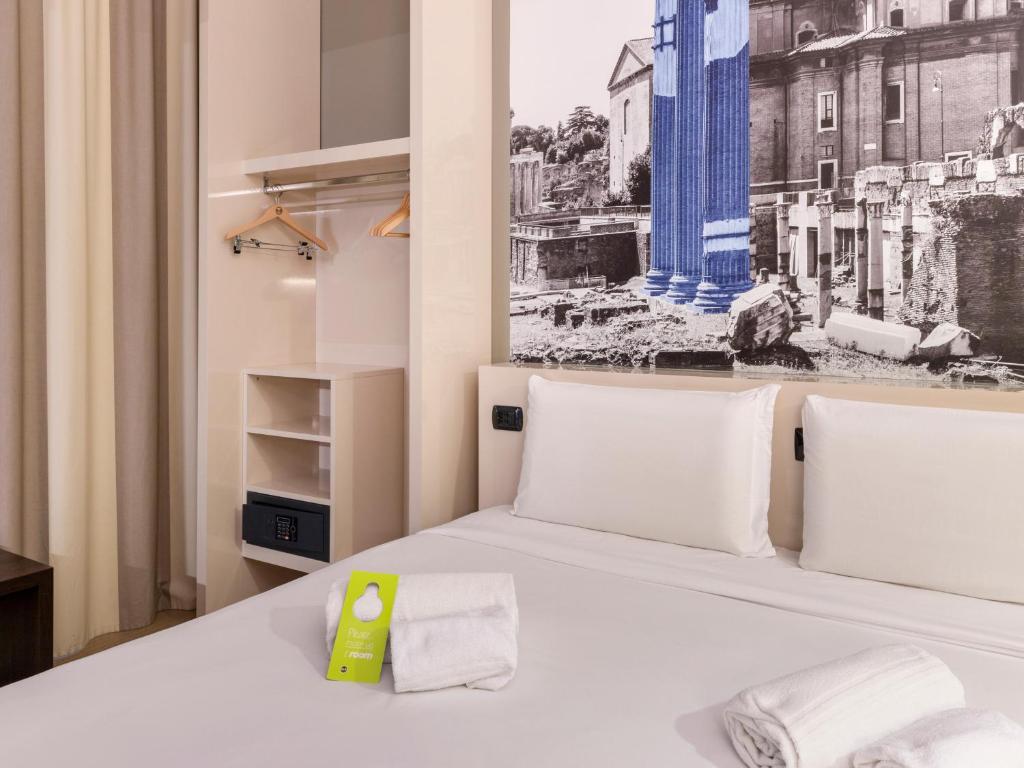 Postel nebo postele na pokoji v ubytování B&B Hotel Roma Trastevere