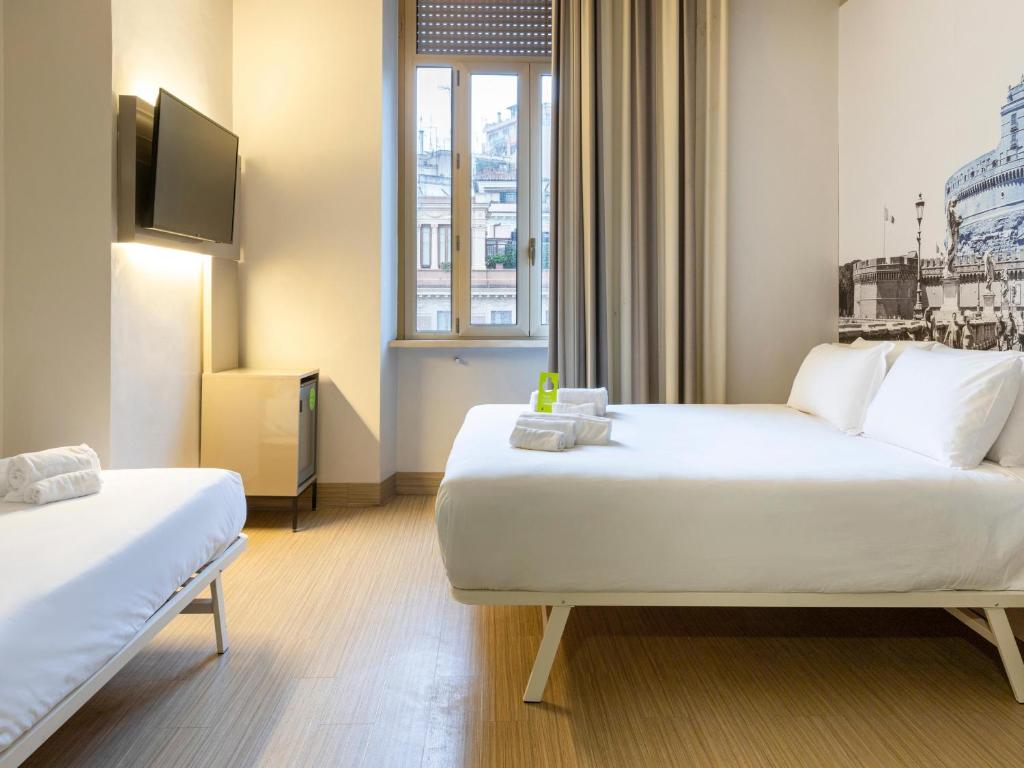 Postel nebo postele na pokoji v ubytování B&B Hotel Roma Trastevere