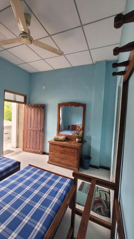 Postel nebo postele na pokoji v ubytování Thomasha Homestay Wellawaya