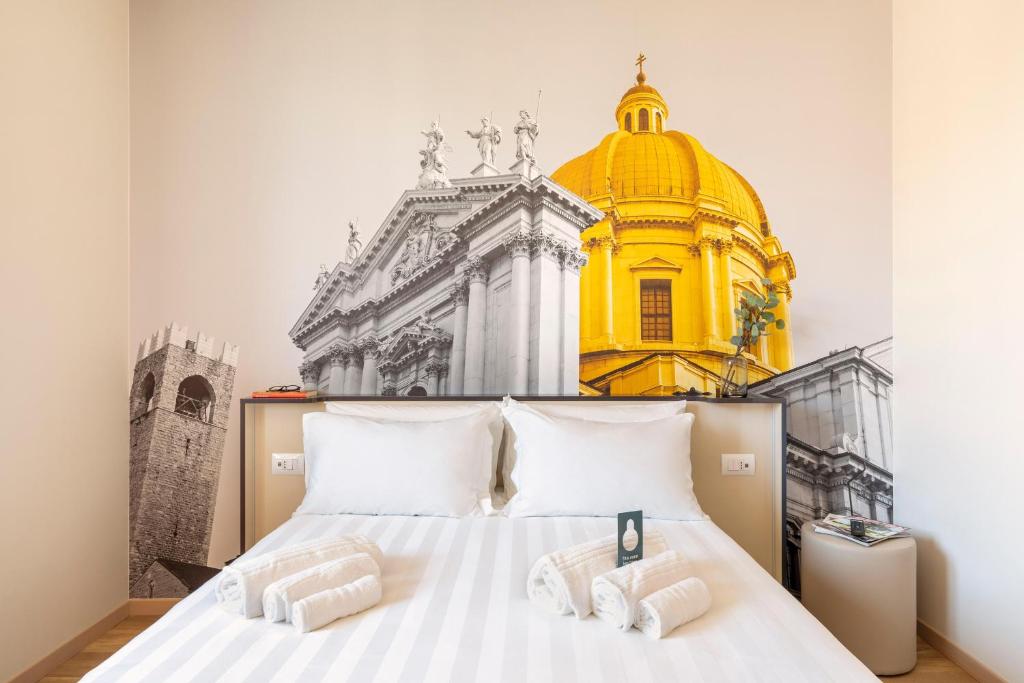 Postel nebo postele na pokoji v ubytování B&B Hotel Brescia