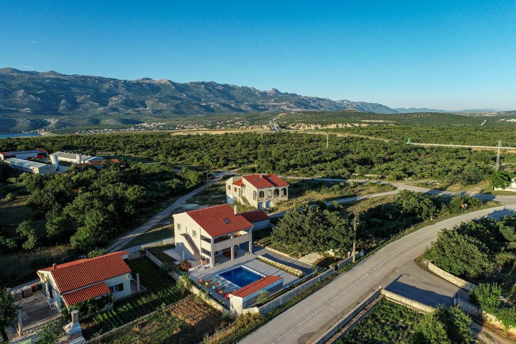 an aerial view of a house with a road at Villa Macanovi dvori with private pool in Knežević
