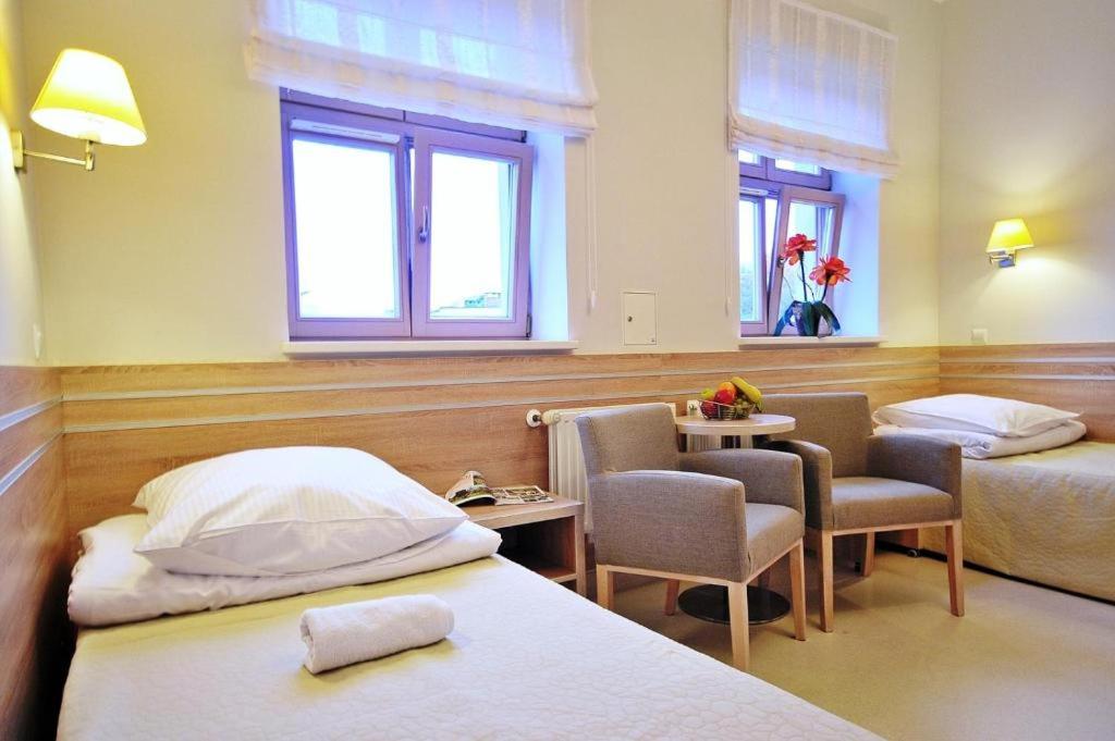 Postel nebo postele na pokoji v ubytování Sanatorium Mewa