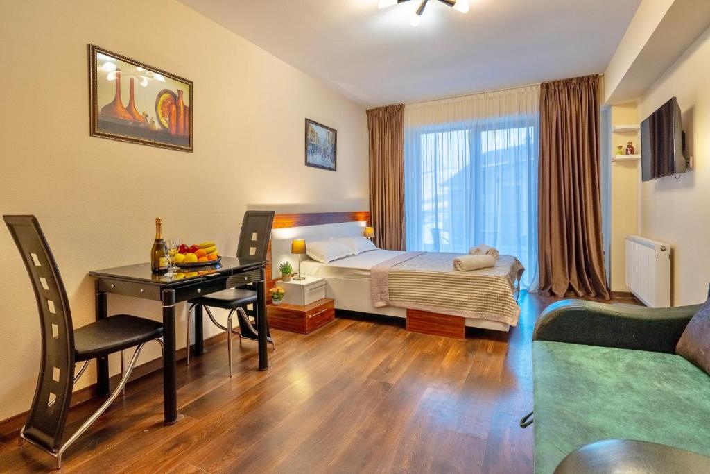 Postel nebo postele na pokoji v ubytování GVC New Gudauri Apartments