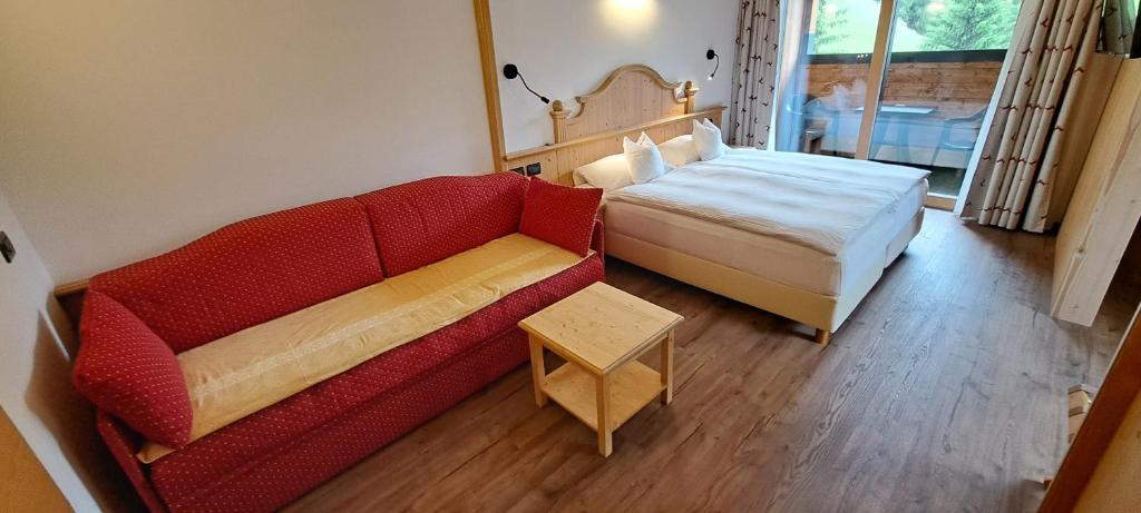 A bed or beds in a room at La Campagnola