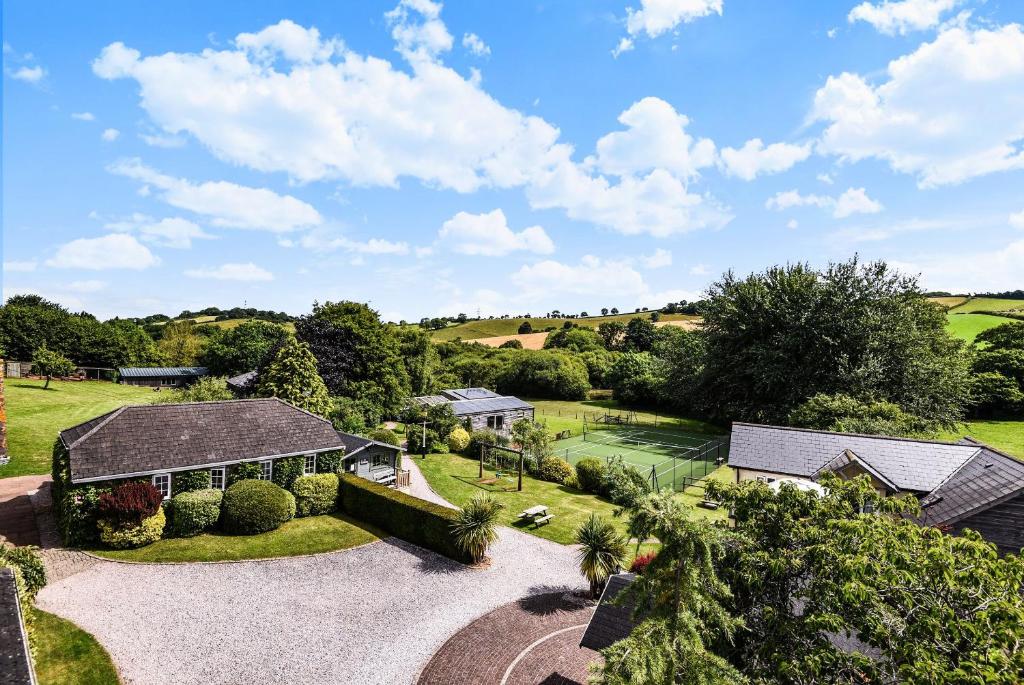 an aerial view of a house with a garden at Bow Cottage in Paignton