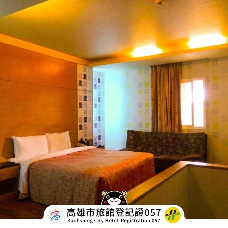 Postel nebo postele na pokoji v ubytování Hua Xiang Motel - Da Liao