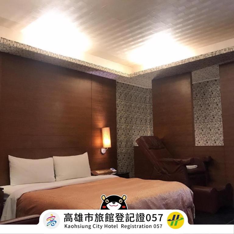 Postel nebo postele na pokoji v ubytování Hua Xiang Motel - Da Liao