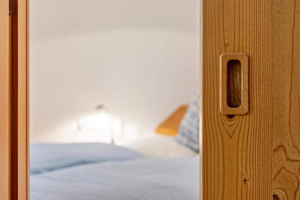 Postel nebo postele na pokoji v ubytování Appartments Reichegger