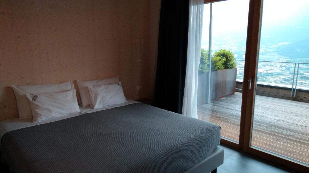 A bed or beds in a room at Agriturismo Margone