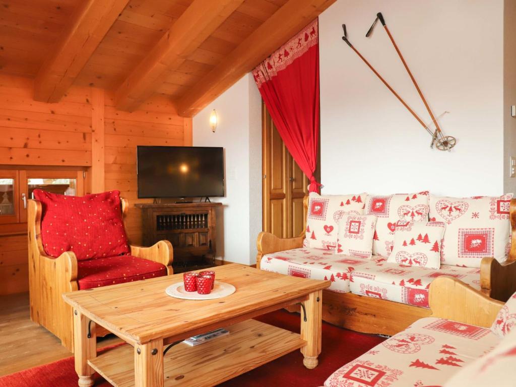 TV a/nebo společenská místnost v ubytování Apartment Boule de Neige by Interhome