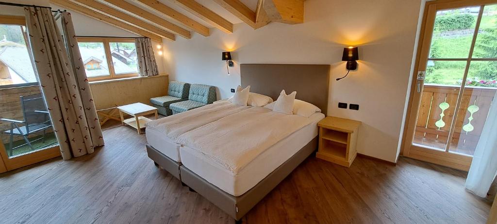 A bed or beds in a room at La Campagnola