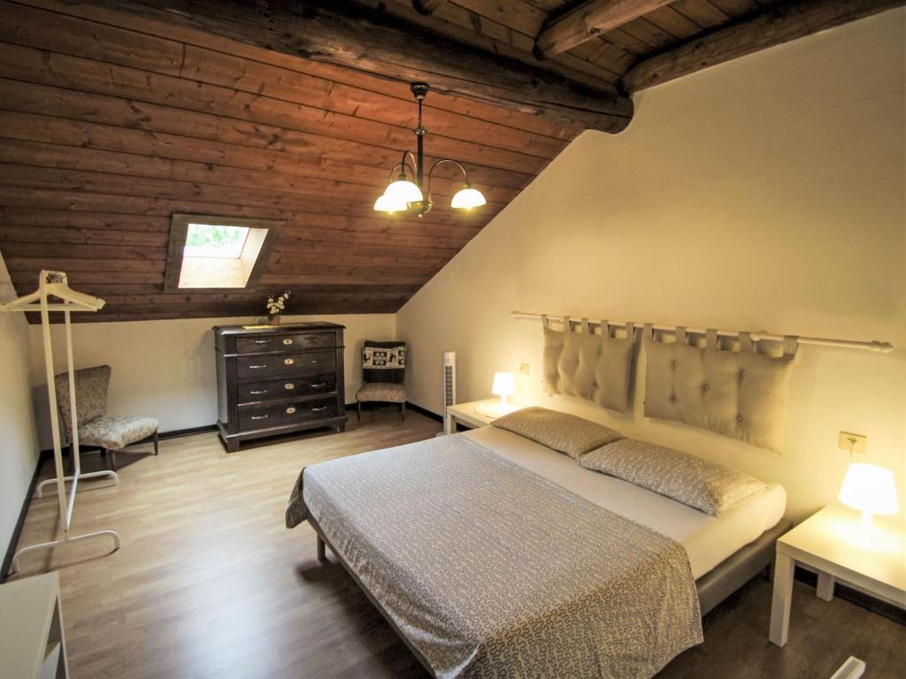 Postel nebo postele na pokoji v ubytování Apartment Ciliegio by Interhome