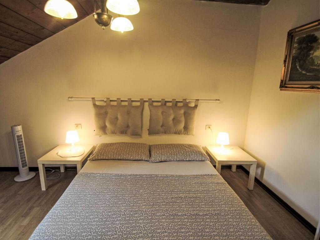 Postel nebo postele na pokoji v ubytování Apartment Ciliegio by Interhome