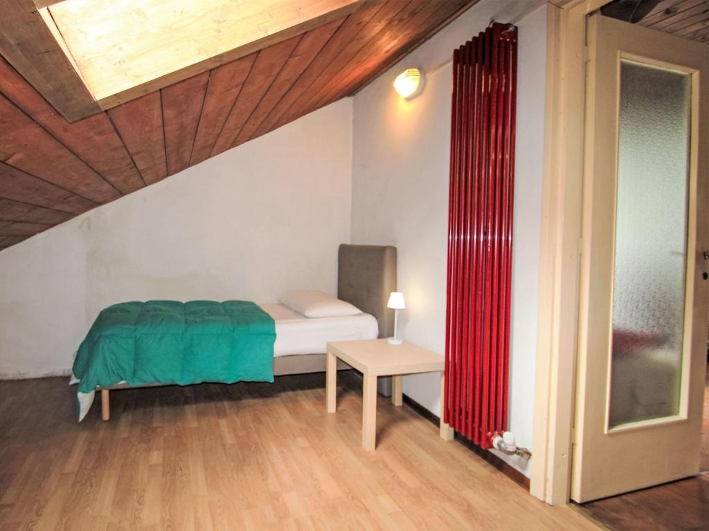 Postel nebo postele na pokoji v ubytování Apartment Ciliegio by Interhome