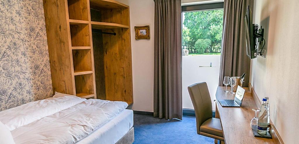 Postel nebo postele na pokoji v ubytování Bad Resort