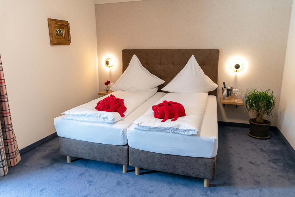 Postel nebo postele na pokoji v ubytování Bad Resort