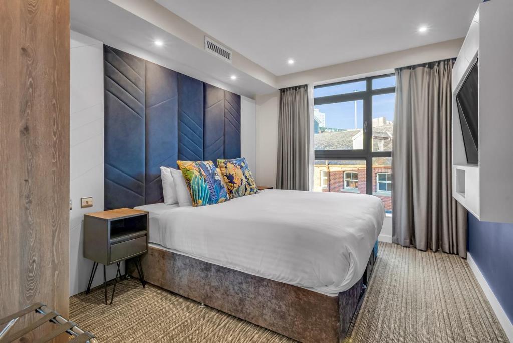 Postel nebo postele na pokoji v ubytování Roomzzz Leeds City