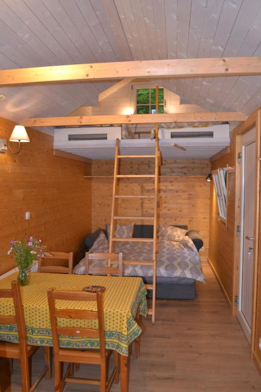 Postel nebo postele na pokoji v ubytování Tiny Parada