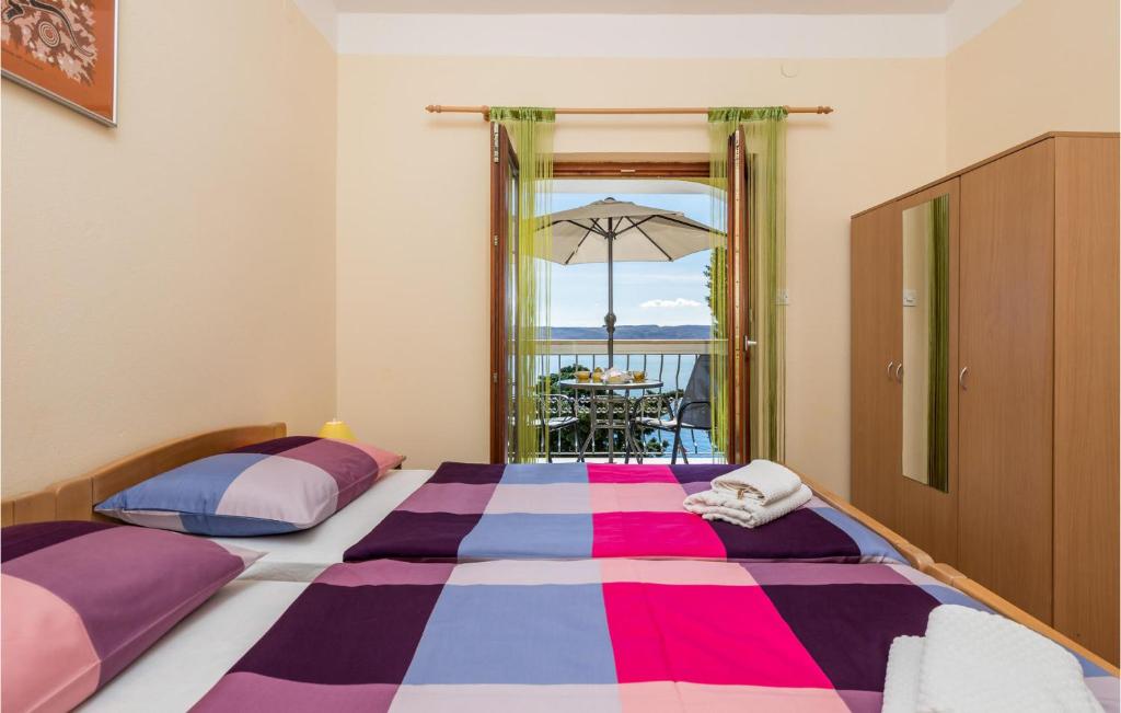 Posteľ alebo postele v izbe v ubytovaní Cozy Apartment In Lukovo Sugarje