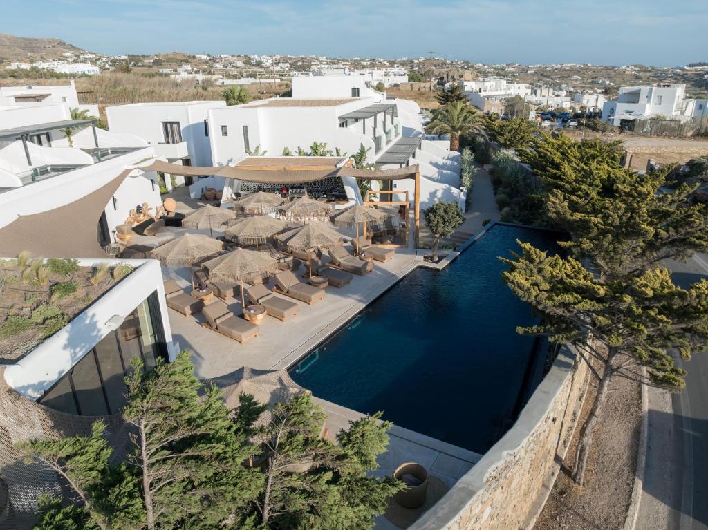 an aerial view of a resort with a swimming pool at Asty Mykonos Hotel & Spa - World of One Hotel Group in Mýkonos City