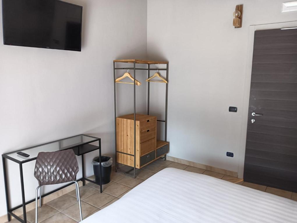 Postel nebo postele na pokoji v ubytování Locanda Da I Baldi