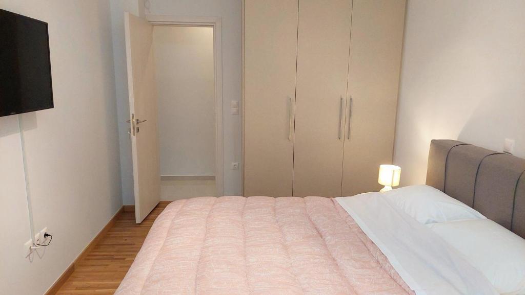 Posteľ alebo postele v izbe v ubytovaní Wonderful apartment in Acropolis
