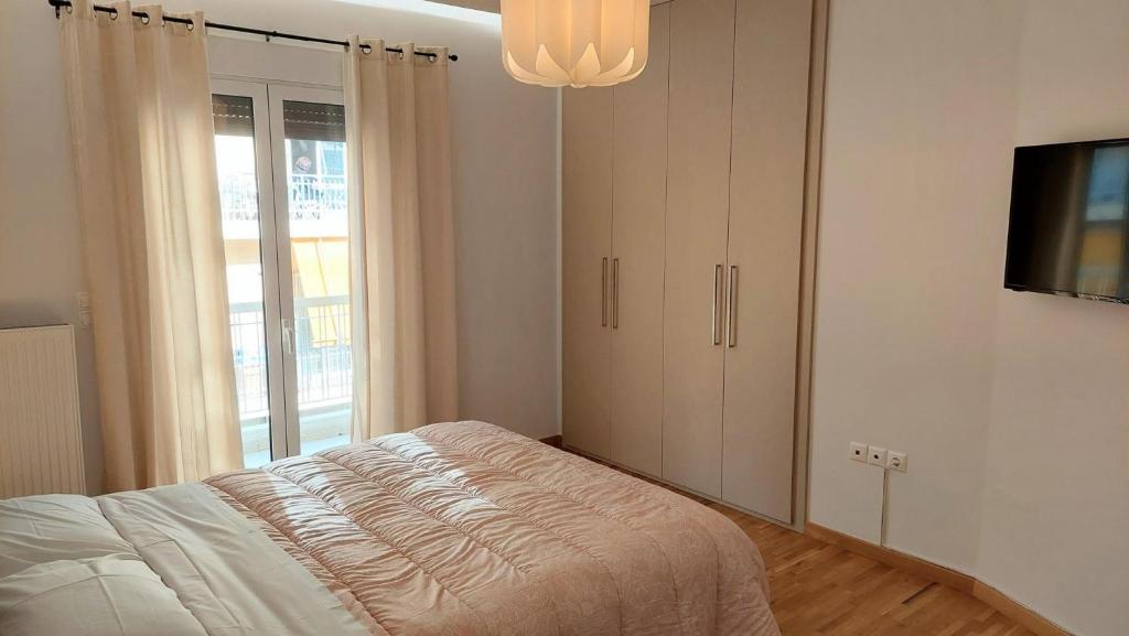 Posteľ alebo postele v izbe v ubytovaní Wonderful apartment in Acropolis