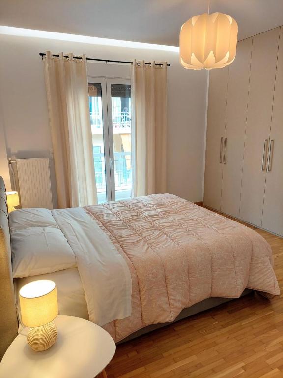 Posteľ alebo postele v izbe v ubytovaní Wonderful apartment in Acropolis