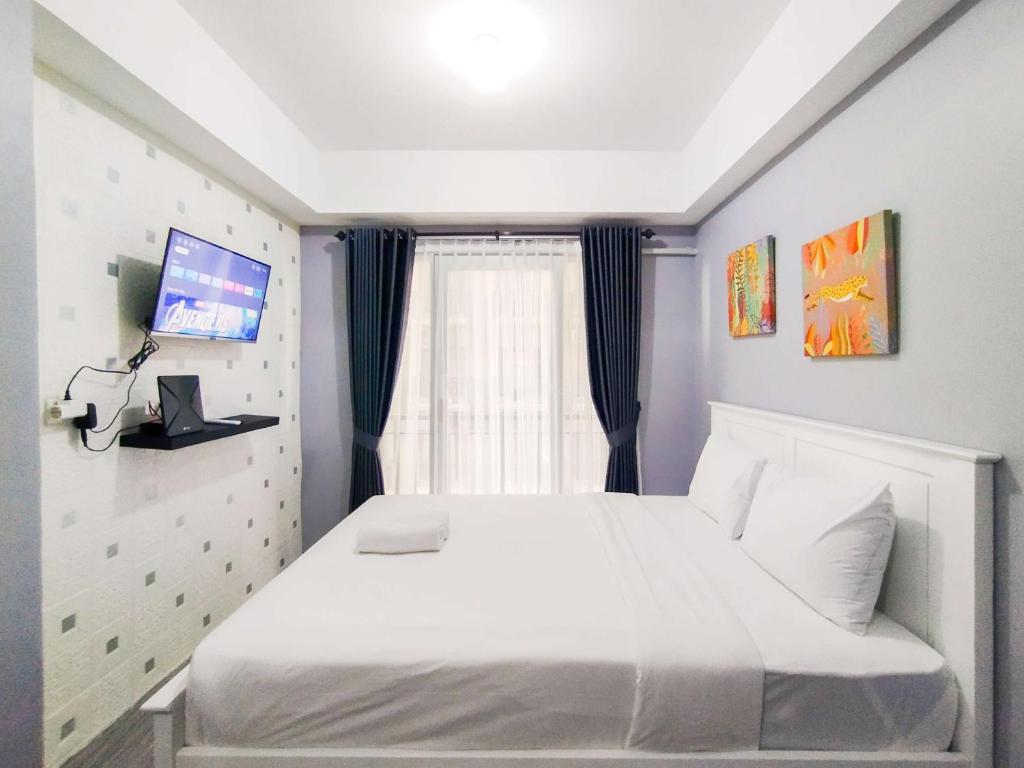 Modern Studio Room Apartment at Grand Asia Afrika By Travelio - Studio Apartment