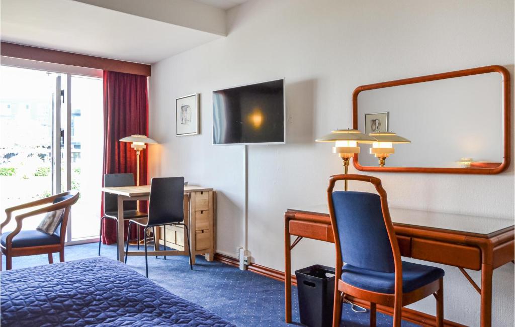 TV a/nebo společenská místnost v ubytování Studio Apartment In Helsingor
