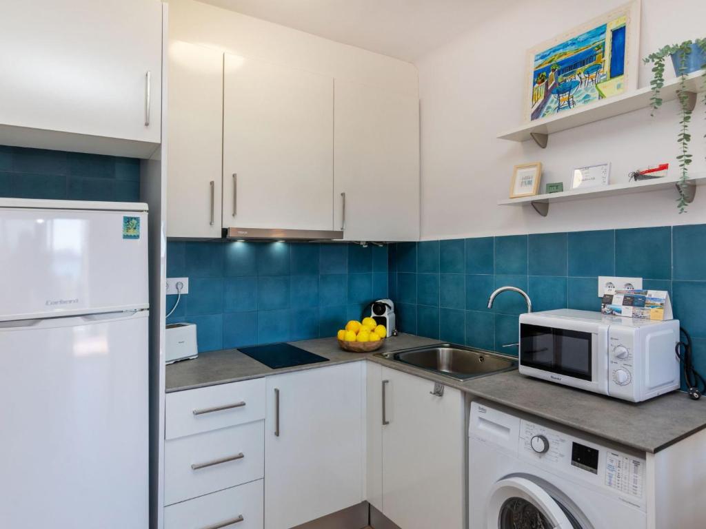 Kuchyňa alebo kuchynka v ubytovaní Apartment Fané de Dalt by Interhome