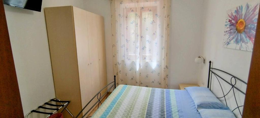 Posteľ alebo postele v izbe v ubytovaní B&B Vetralla