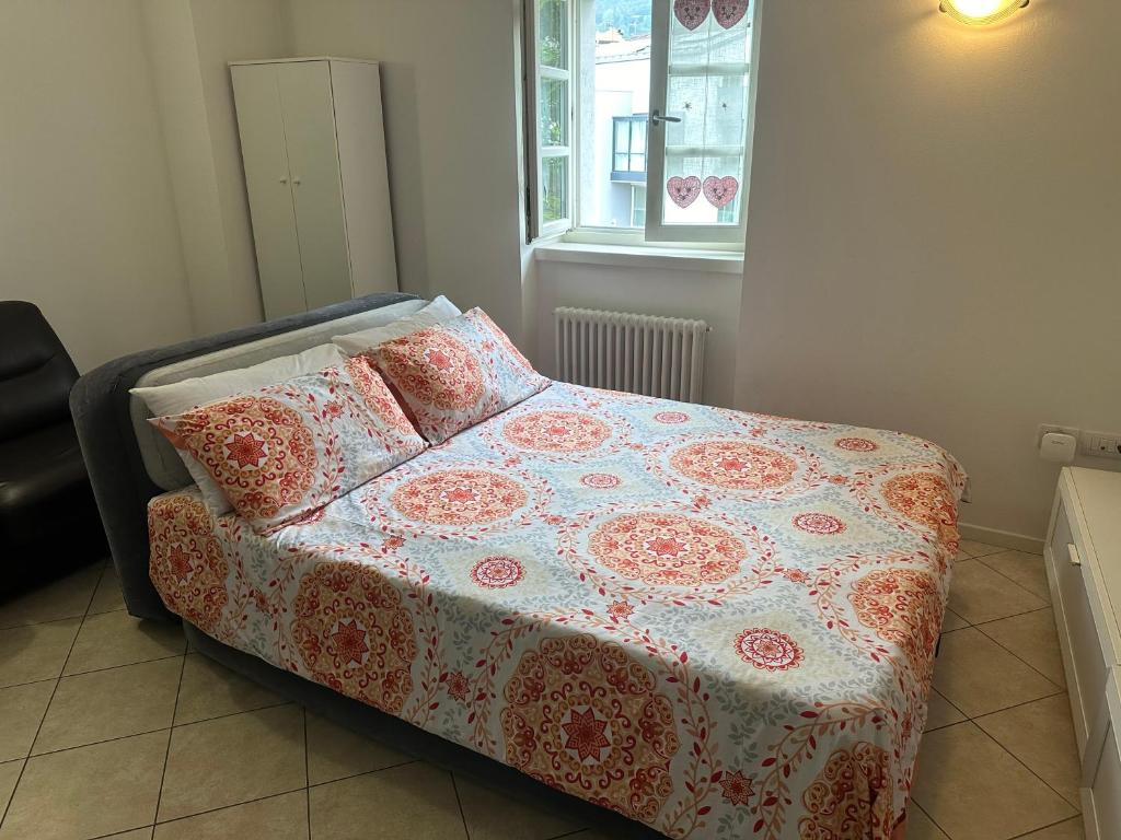 Postel nebo postele na pokoji v ubytování Val di Non Apartment