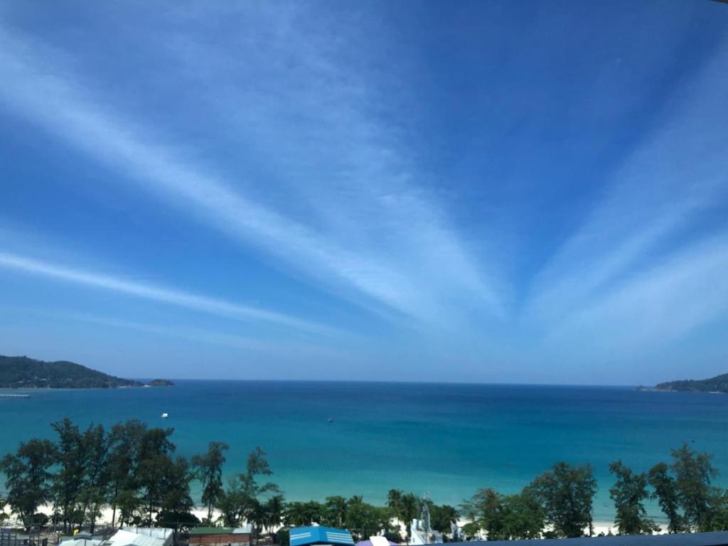 a view of the ocean from a beach at Patong Tower 2 Bedrooms Sea View Top Top in Patong Beach