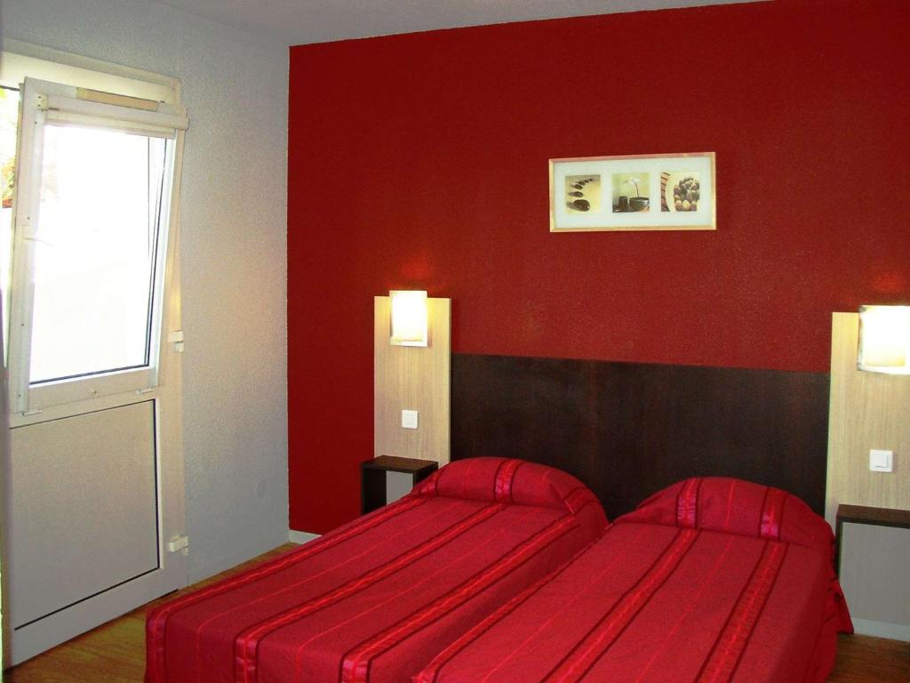 Postel nebo postele na pokoji v ubytování Brit Hotel Essentiel Sète / Balaruc