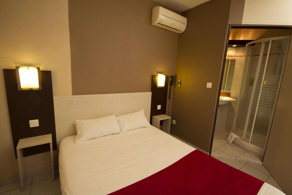 Postel nebo postele na pokoji v ubytování Brit Hotel Essentiel Sète / Balaruc