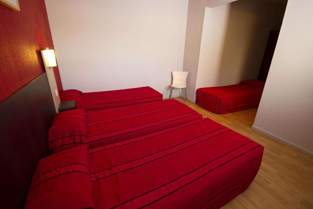 Postel nebo postele na pokoji v ubytování Brit Hotel Essentiel Sète / Balaruc