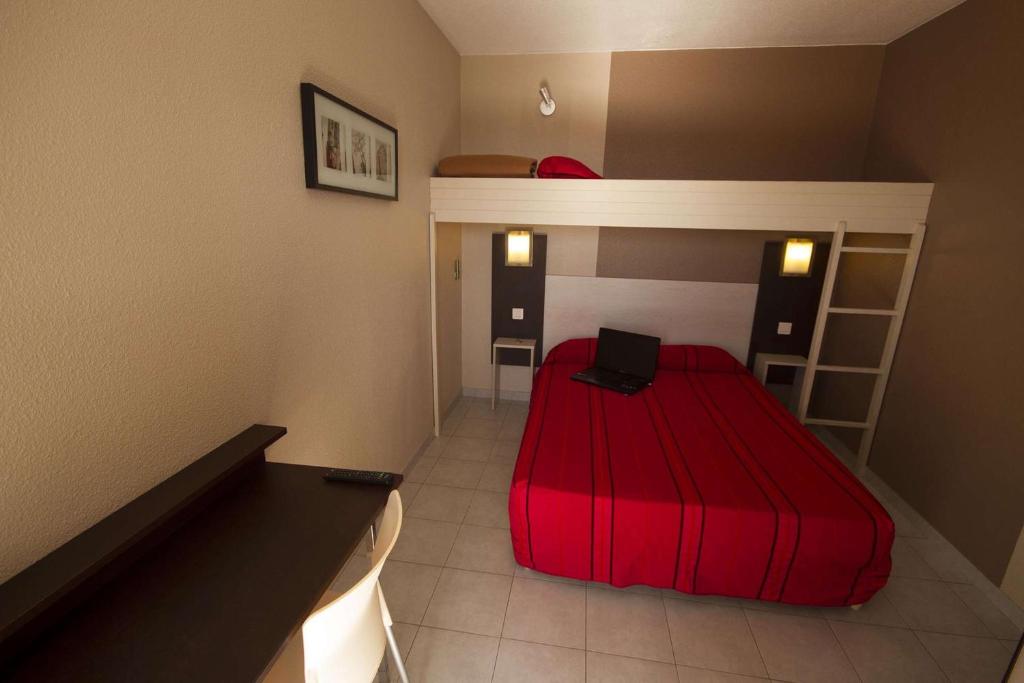 Postel nebo postele na pokoji v ubytování Brit Hotel Essentiel Sète / Balaruc