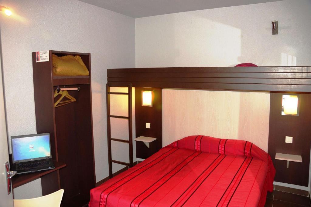 Postel nebo postele na pokoji v ubytování Brit Hotel Essentiel Sète / Balaruc