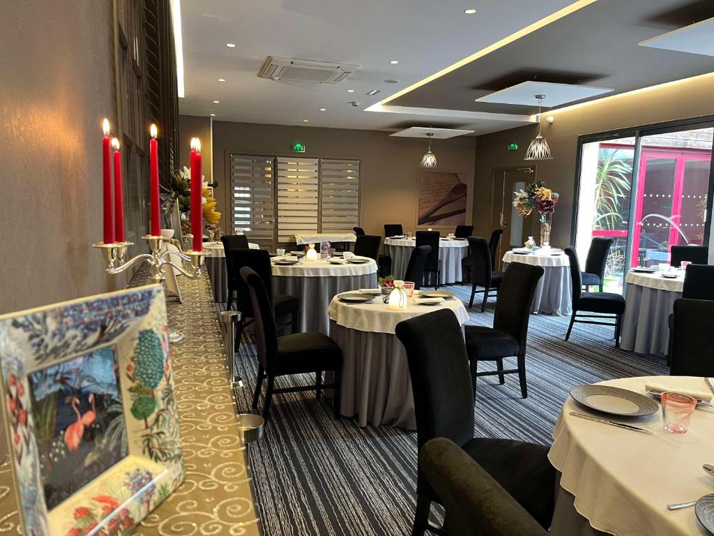 Restaurace v ubytování Brit Hotel Du Dauphin L'Aigle