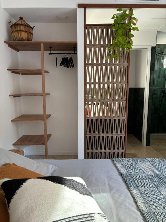 Postel nebo postele na pokoji v ubytování Maison Lumio