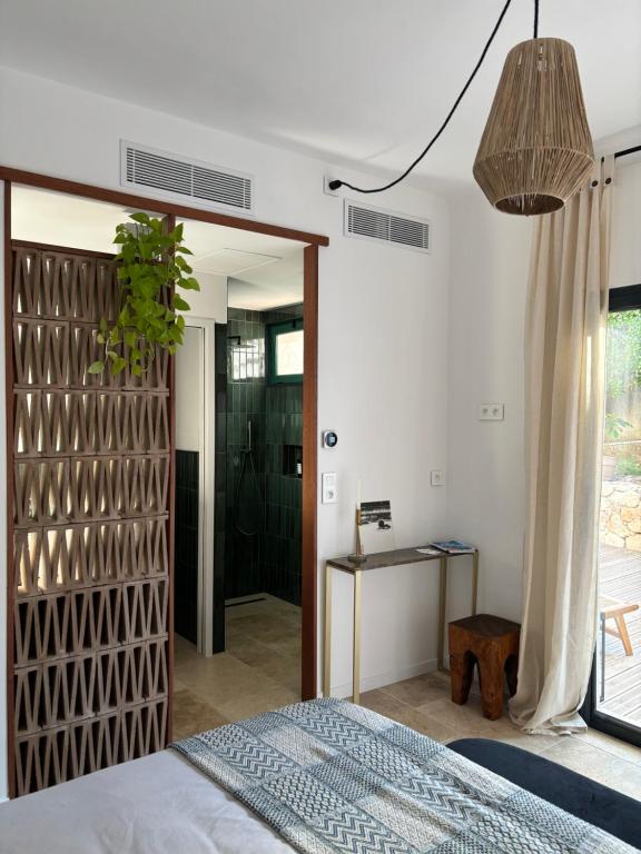 Postel nebo postele na pokoji v ubytování Maison Lumio